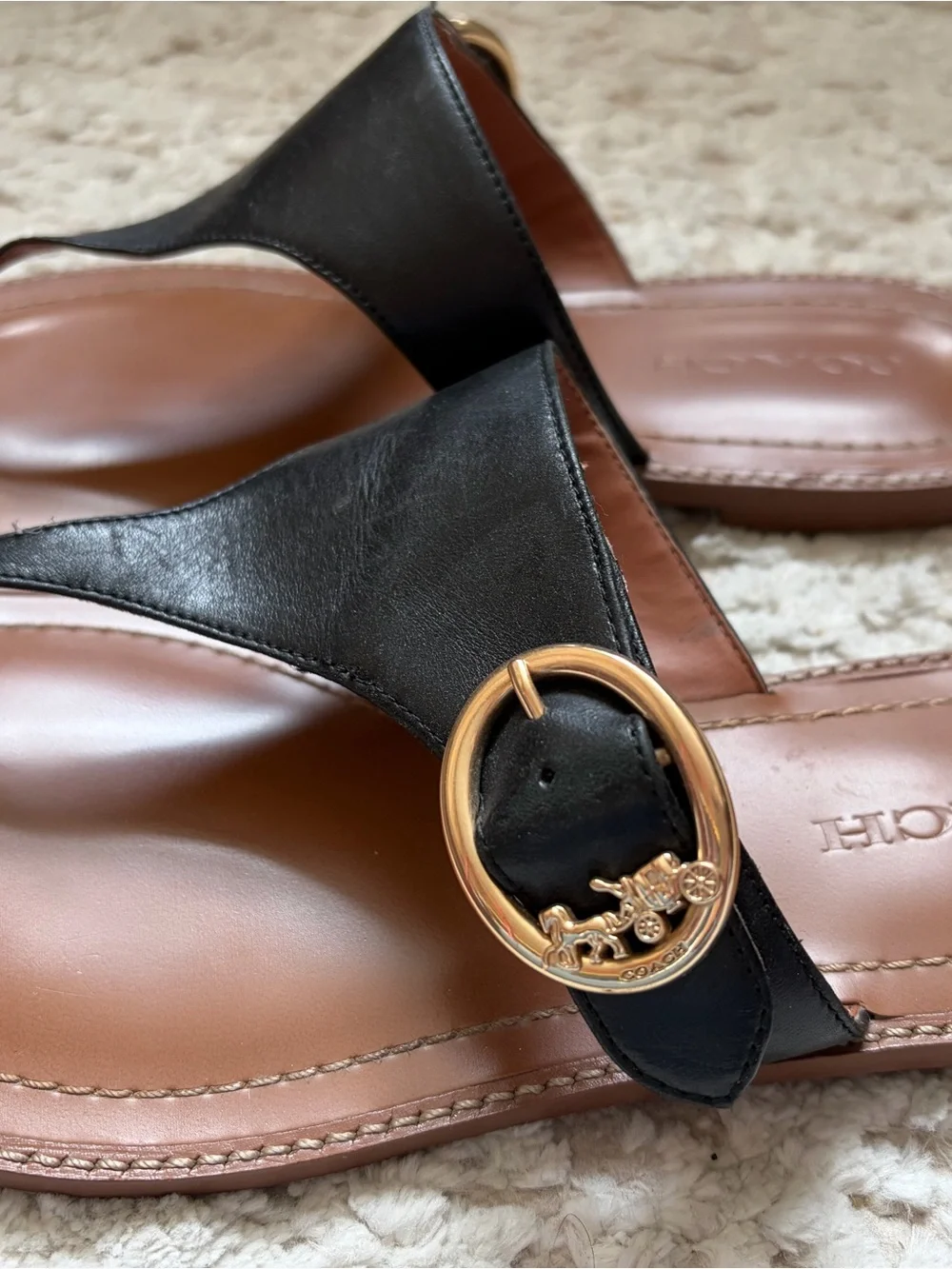 Coach Black Leather Slide Sandals with Gold Buckle Accent